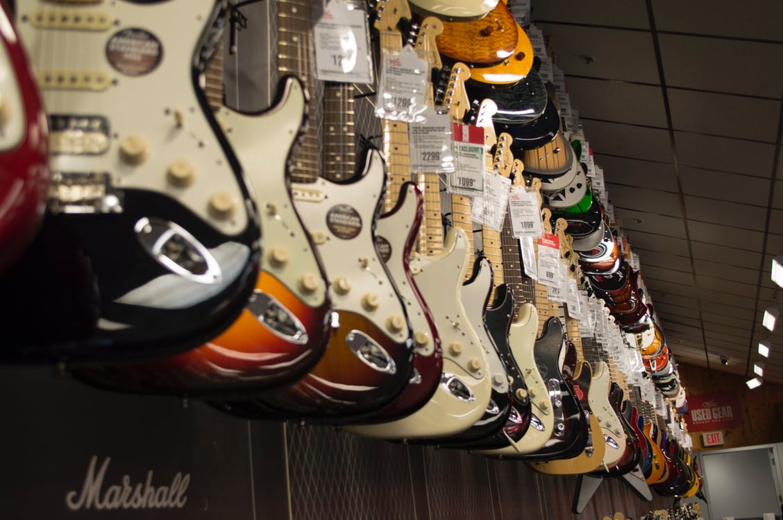Electric Guitars Hanging in Store Electric Guitars Hanging in Store