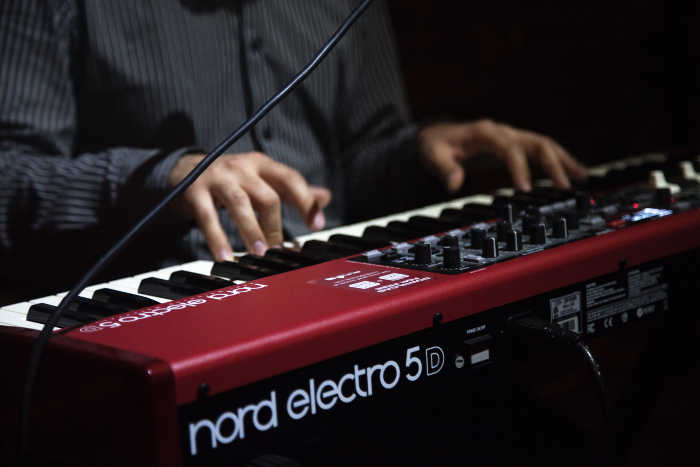 Man Playing Nord Digital Piano Man Playing Nord Digital Piano